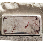 Il tuffatore di Paestum su piastrella in marmo Botticino